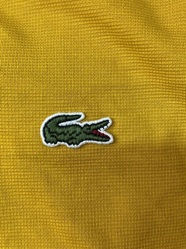 Желтое поло Lacoste