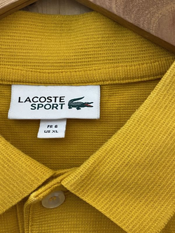 Желтое поло Lacoste